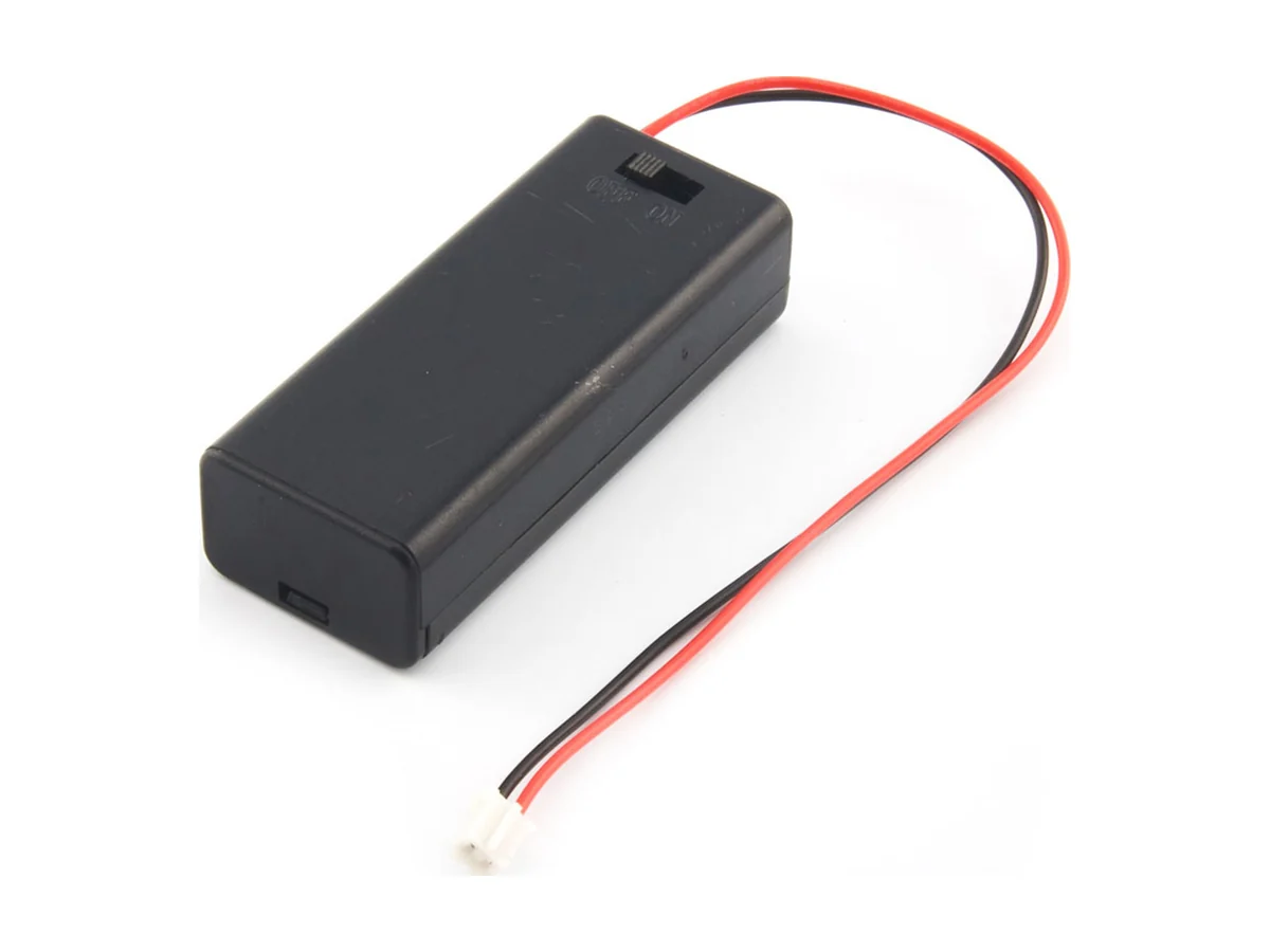 A black micro:bit battery box for two AAA batteries, with an on and off switch and its lead