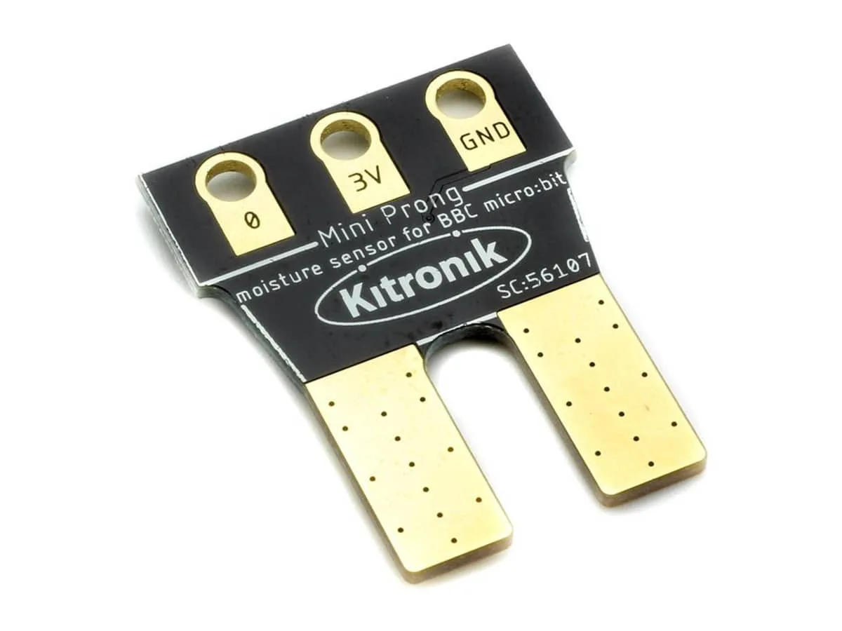 The Kitronik Mini Prong Soil Moisture Sensor on white: a black board with the Kitronik name, three ring connectors (0, 3V, GND) and two gold prongs